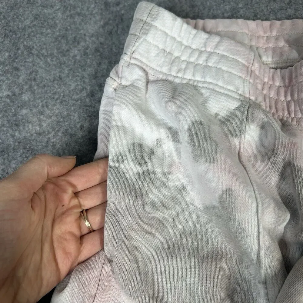 Nike Women's Tie-Dye Track Pants in Light Pink and Gray